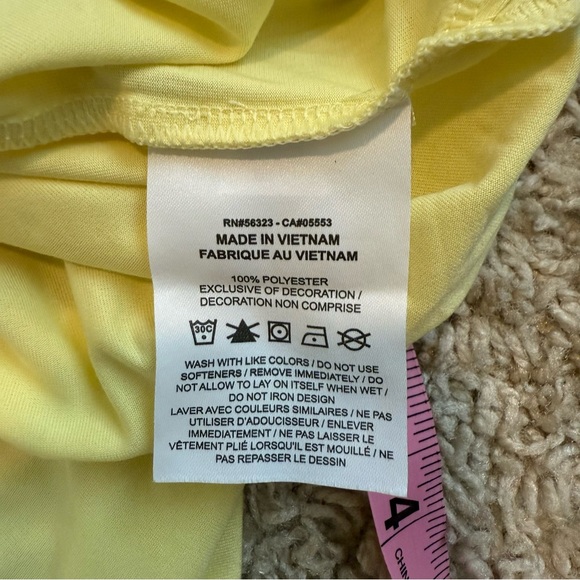 Nike Logo Crop Relaxed Dri-Fit Tee - Picture 6 of 6